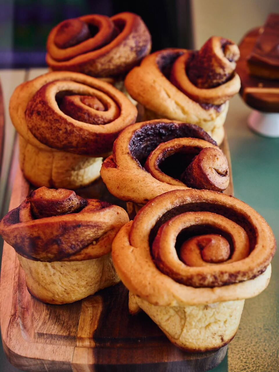 Cinnamon swirls on a wooden board